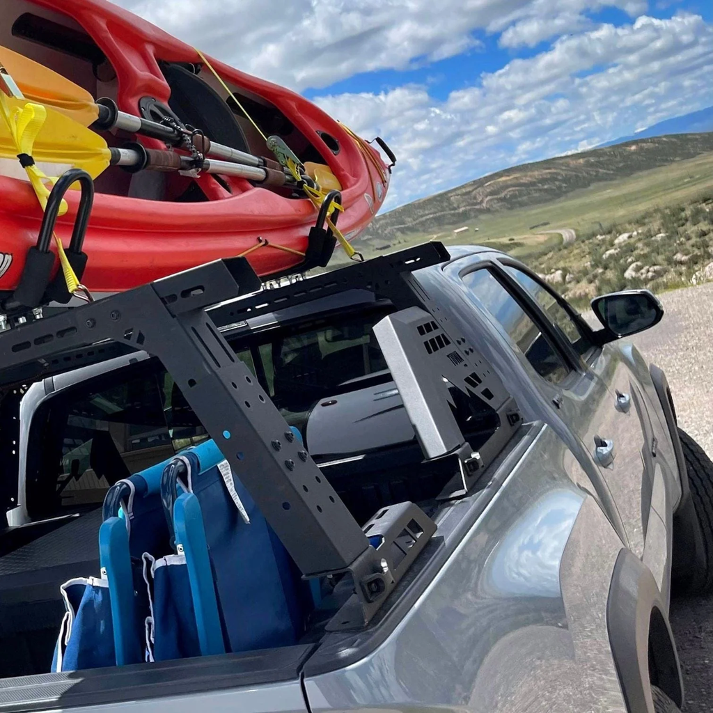 Multiple Load and Oversized Cargo mounted on the Moab Bed Rack System for Toyota Tacoma