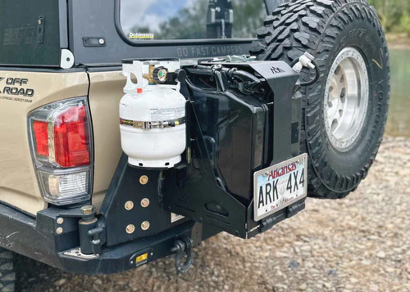 Backwoods Double Jerry Can Carrier Side View Mounted On A Vehicle