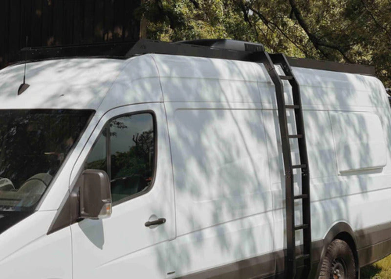 Side View Of The Mercedes Sprinter With A Backwoods DRIFTR Sprinter Ladder Attached To Its Side