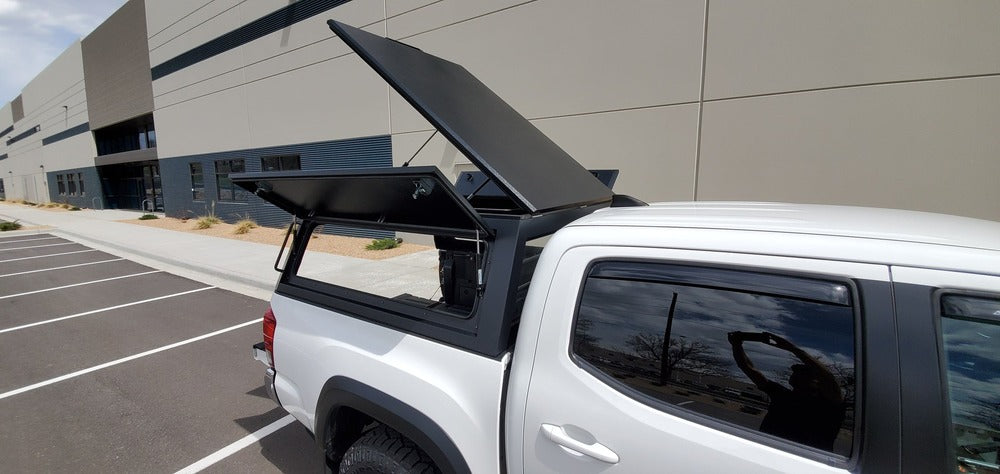 Installed GAIA Campers Tacoma Truck Cap With All Doors Opened