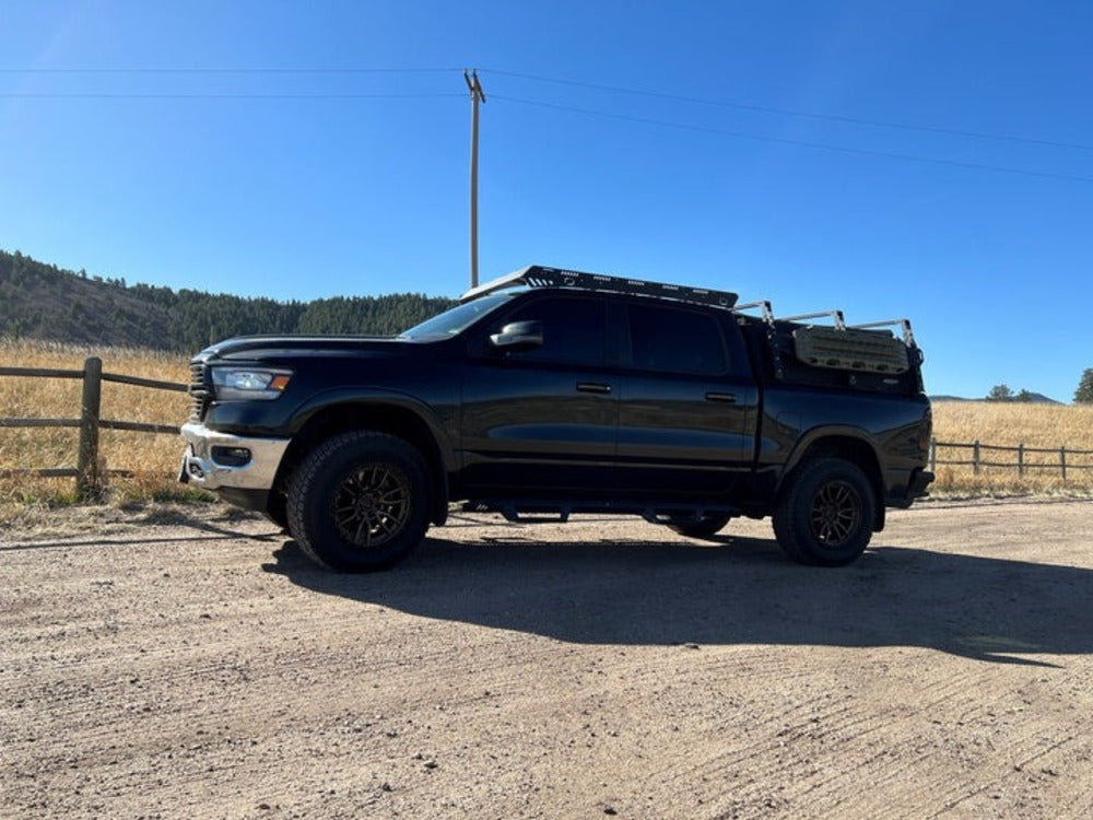 Side View Of The upTOP Overland Bravo 5th Gen RAM 1500 Crew Cab Roof Rack