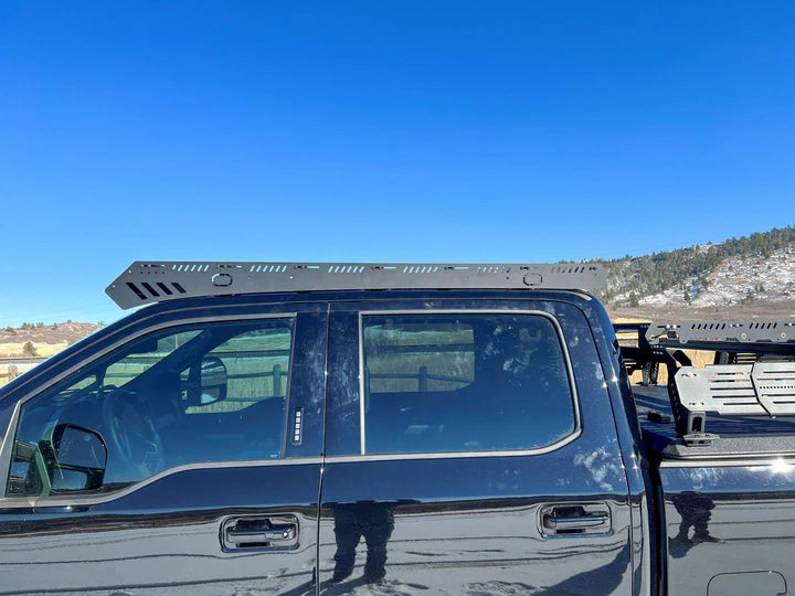 Image showing the uPtop Overland platform roof rack mounted on the Ford F250 in action