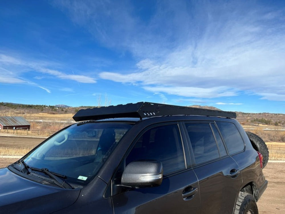 Mounted upTOP Overland Bravo Land Cruiser 200 Roof Rack With Integrated Wind Deflector