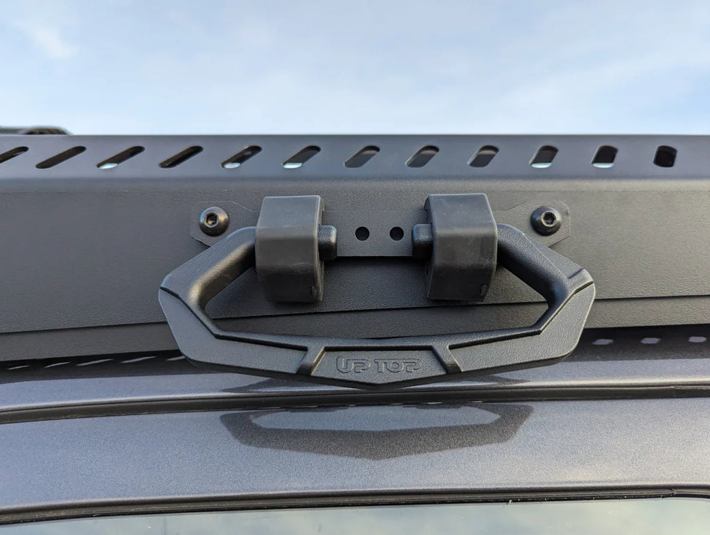 Close up view of the handle bar of the upTOP Overland Zulu Roof Rack RAM 2500/3500 5th Gen