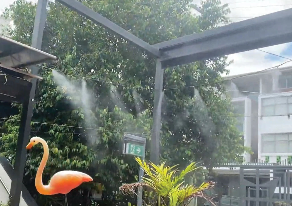 The ExtremeMist 50 Nozzle High Pressure Misting System Used as an airconditioner in the garden