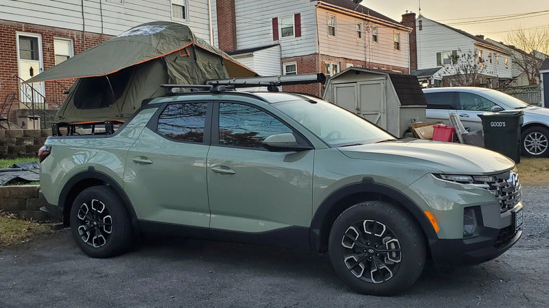 Side View Of The BillieBars Bed Bars For Hyundai Santa Cruz With A Deployed Roof Top Tent