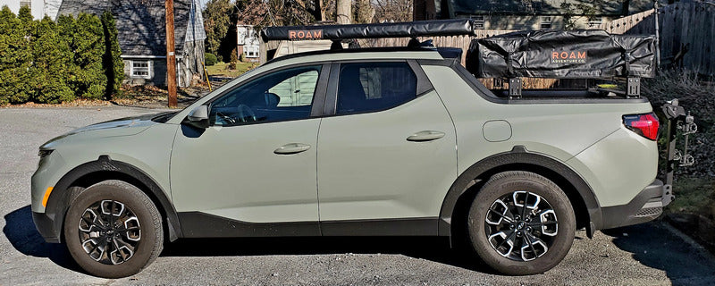 Side View Of BillieBars Bed Bars For Hyundai Santa Cruz With Packed Up Roof Top Tent