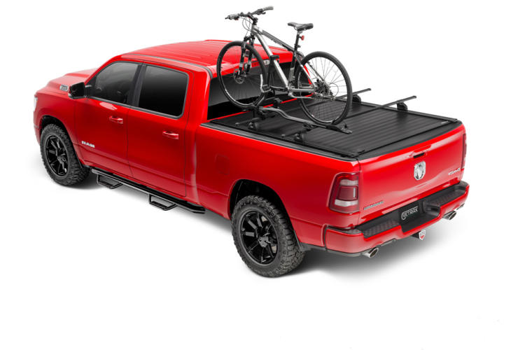 Retrax PowertraxPRO XR Truck Bed Cover For Dodge Ram 1500, 2500 & 3500 with a bike carrier
