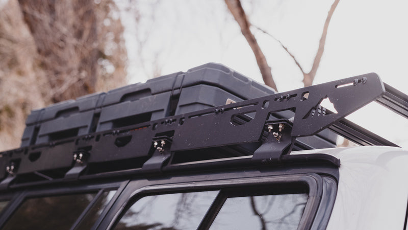 Side View Of The Sherpa 80 Series Land Cruiser Roof Rack With Cargo On Top Of It