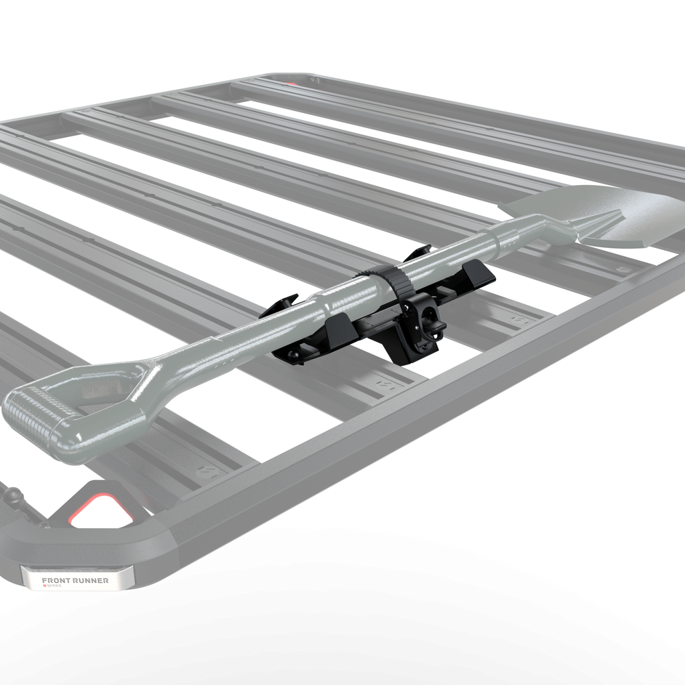 Slimline 3 shovel mount holding a spade flat on top of the roof rack