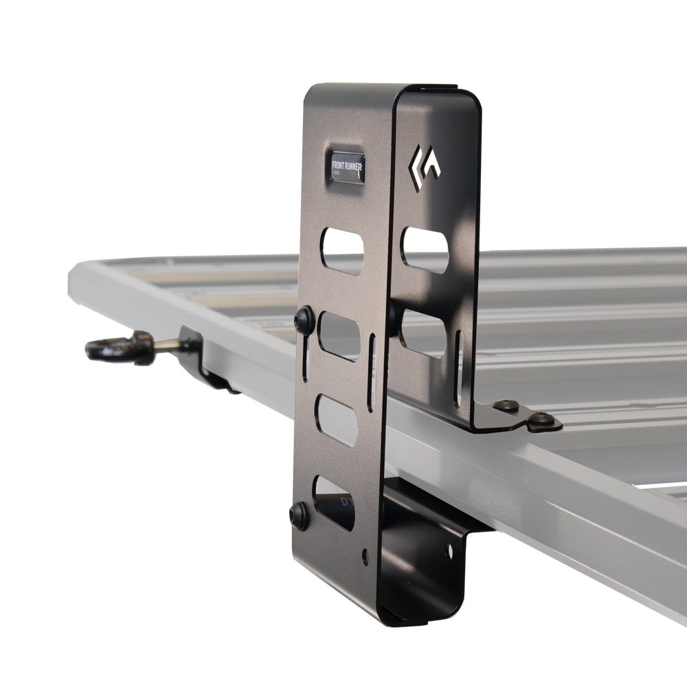 Front Runner axe bracket holding a long handled axe on the rack