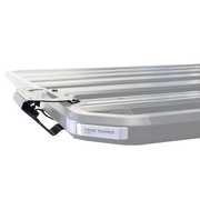 Front Runner grab handle in use reaching gear on a loaded roof rack
