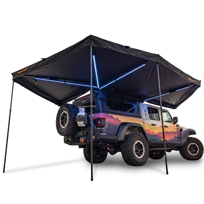 23Zero Onyx 270 awning fully deployed showing 6-arm aluminum box-truss support poles extended