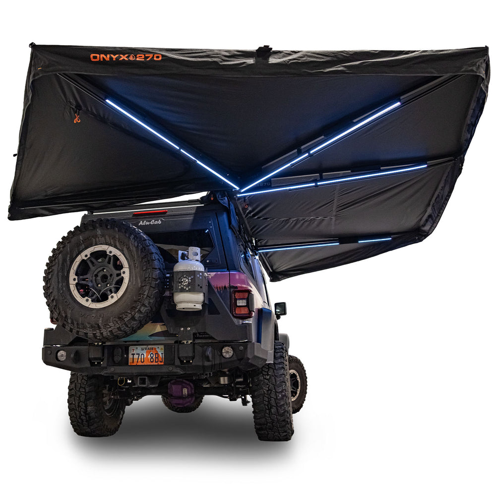23Zero Onyx 270 awning rear view showing illuminated LED light strips at night