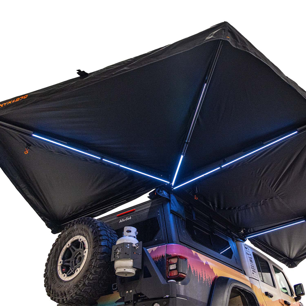 Onyx 270 awning truss arms and LED lighting close-up at dusk