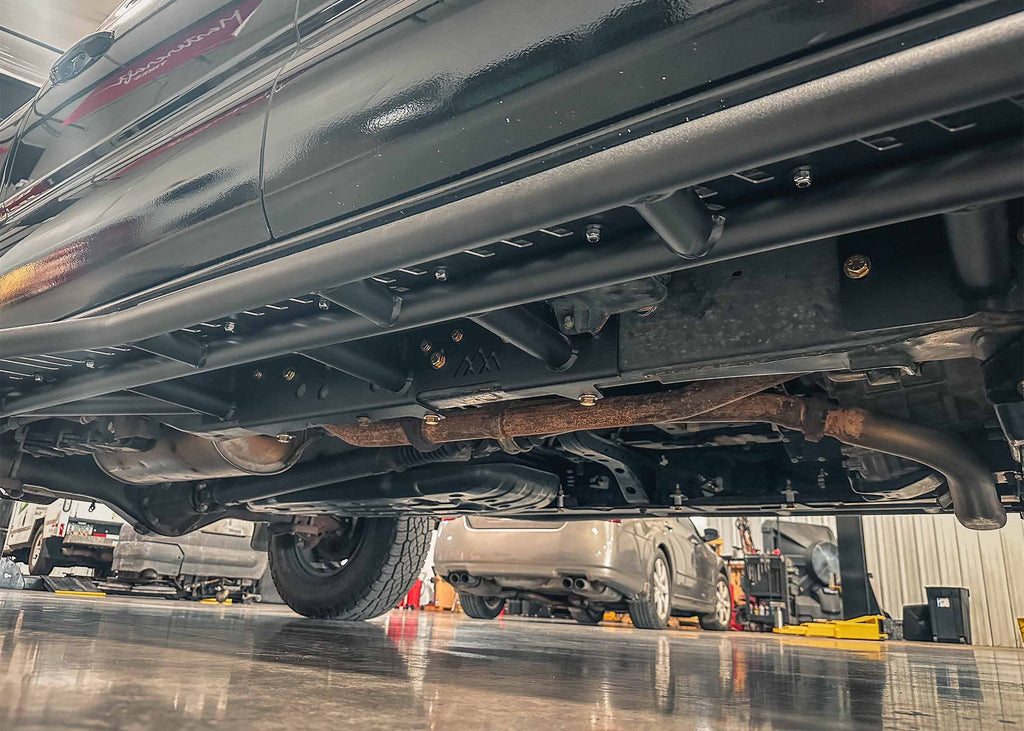 Close up of the bolt-on frame installation of the Backwoods Adventure Mods 2005-2023 2nd and 3rd Gen Toyota Tacoma Rock Sliders