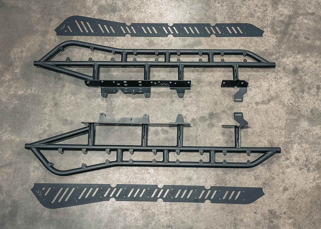 Installation components for the Backwoods Adventure Mods 2005-2023 2nd and 3rd Gen Toyota Tacoma Rock Sliders