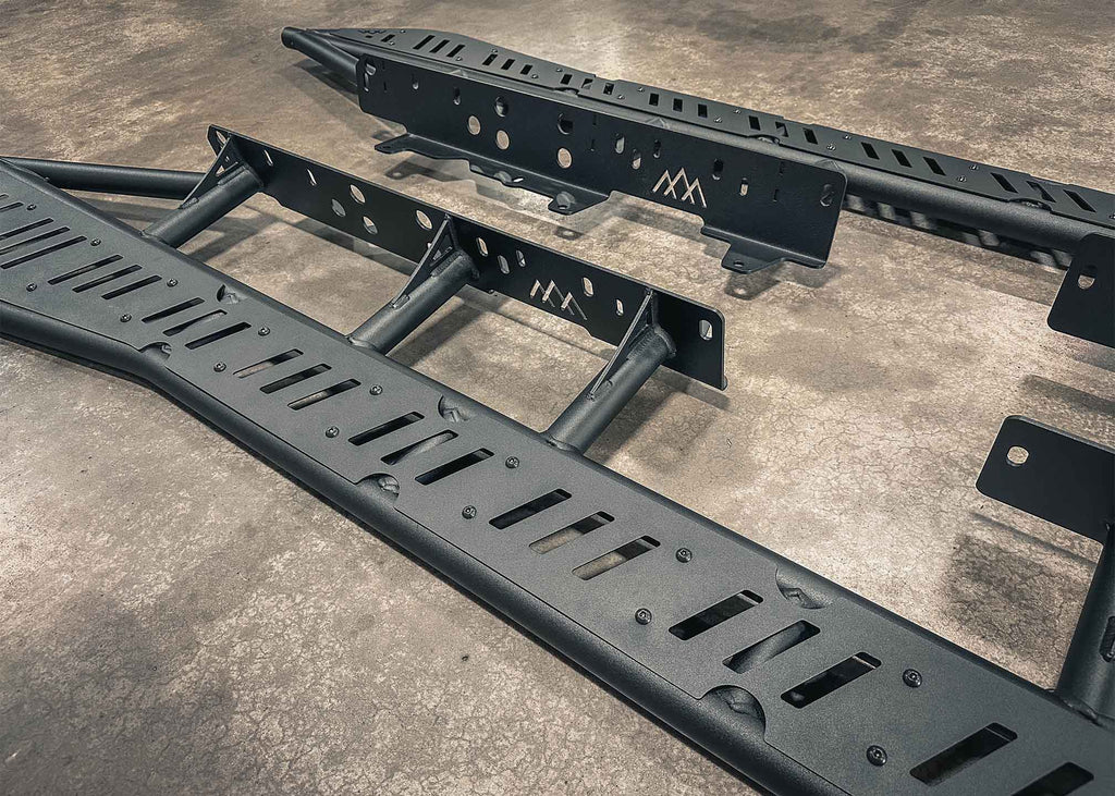 Image showing the mounting brackets of the Backwoods Adventure Mods 2005-2023 2nd and 3rd Gen Toyota Tacoma Rock Sliders