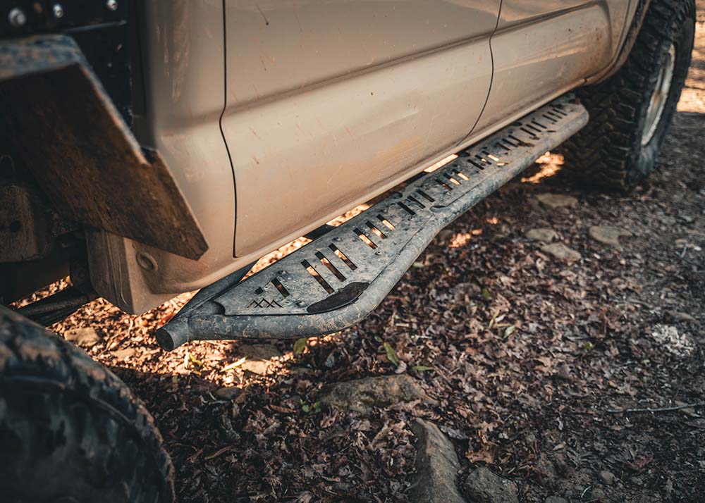 Backwoods Adventure Mods 2005-2023 2nd and 3rd Gen Toyota Tacoma Rock Sliders in use while off roading