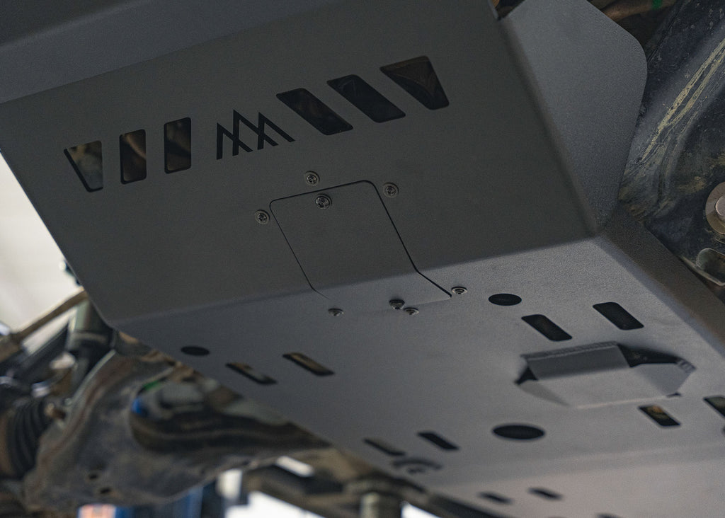 Close up of the service access panel on the Backwoods Adventure Mods Aluminum 2nd and 3rd Gen Toyota Tacoma Skid Plate Kit