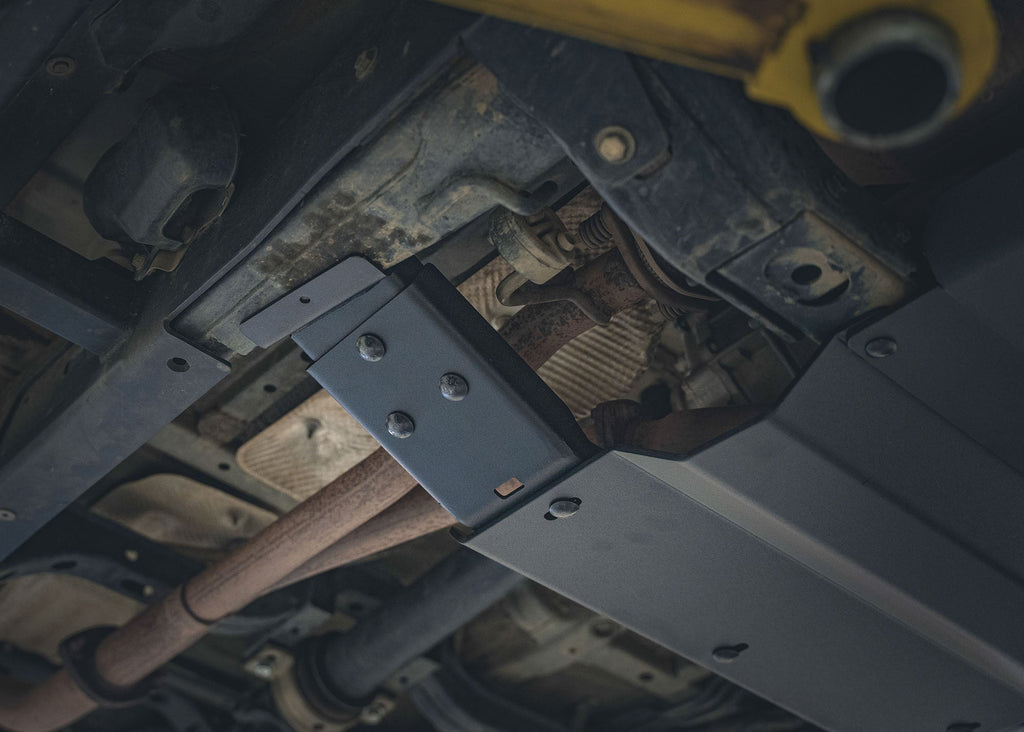 Close up of the frame mount for the Backwoods Adventure Mods Aluminum 2nd and 3rd Gen Toyota Tacoma Skid Plate Kit