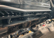 Close up of the bolt-on frame installation of the Backwoods Adventure Mods 2010-2024 5th Gen Toyota 4Runner Rock Sliders