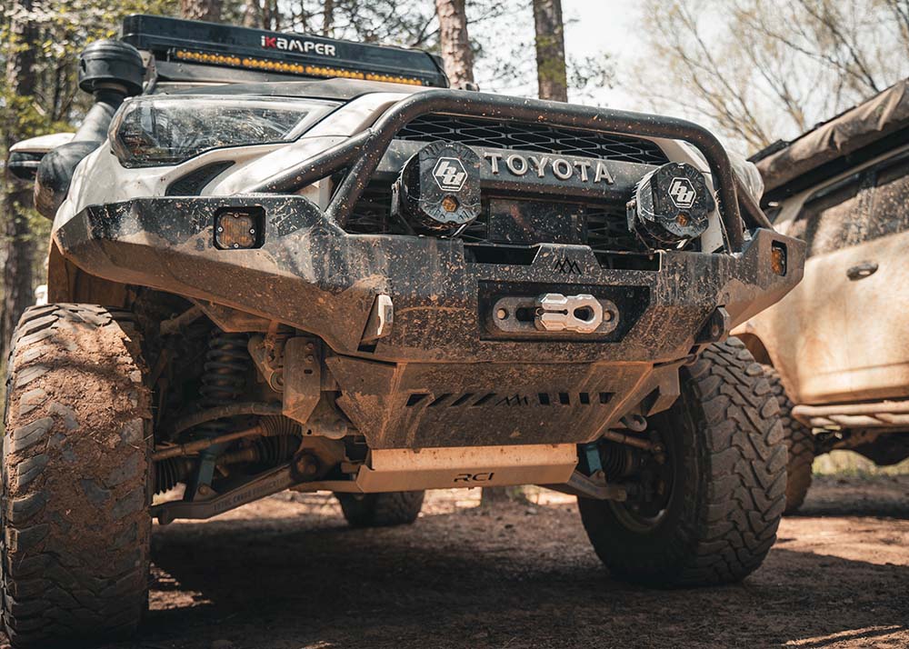 Image of a Toyota 4Runner 5th Gen (2010-2024) with Aluminum Connector Skid Plate and Backwoods Adventure Mods Off Road Front Bumper installed