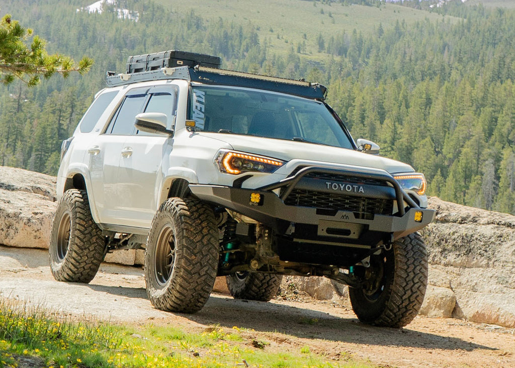 Backwoods Adventure Mods 2010-2024 Toyota 4Runner Off Road Prerunner Bull Bar Front Bumper on a white 5th Gen 4Runner Overland build