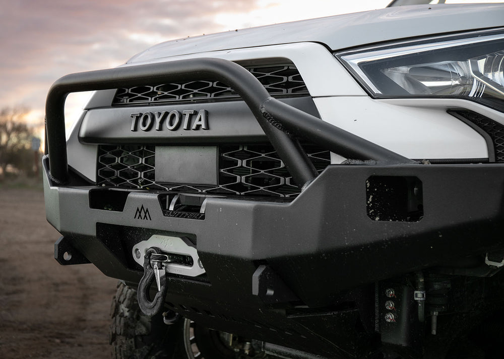 Close up of the Prerunner Bull Bar on the Backwoods Adventure Mods Hi-Lite Overland Hybrid off road 5th Gen Toyota 4Runner Front Bumper