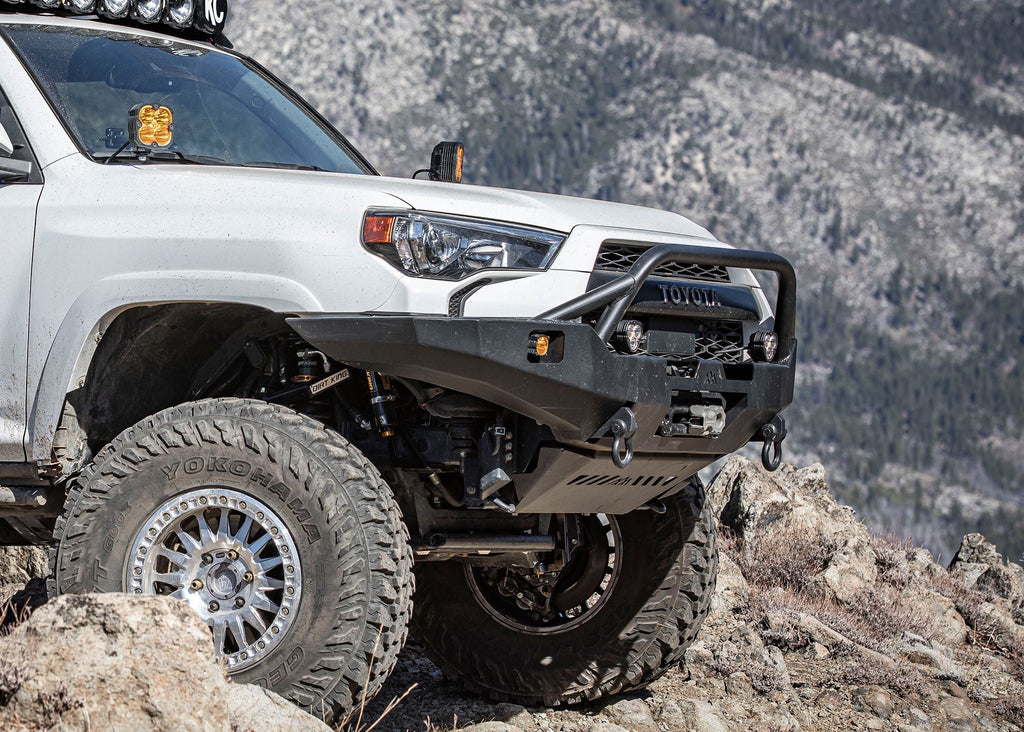 Image showing the increased ground clearance of the Backwoods Adventure Mods Hi-Lite Overland Hybrid 5th Gen Toyota 4Runner Front Bumper with Prerunner Bull Bar 