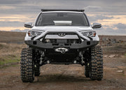 5th Gen Toyota 4runner on portal axles equipped with a Backwoods Adventure Mods Hi-Lite Overland Front winch Bumper with Prerunner Bull Bar 
