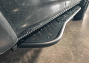 Close up image of the Backwoods Adventure Mods 2010-2024 5th Gen Toyota 4Runner bolt-on Rock Sliders kick-out