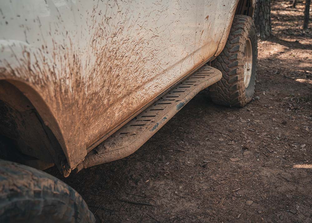 Backwoods Adventure Mods 2010-2024 5th Gen Toyota 4Runner Rock Sliders being used off road