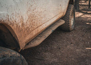 Backwoods Adventure Mods 2010-2024 5th Gen Toyota 4Runner Rock Sliders being used off road
