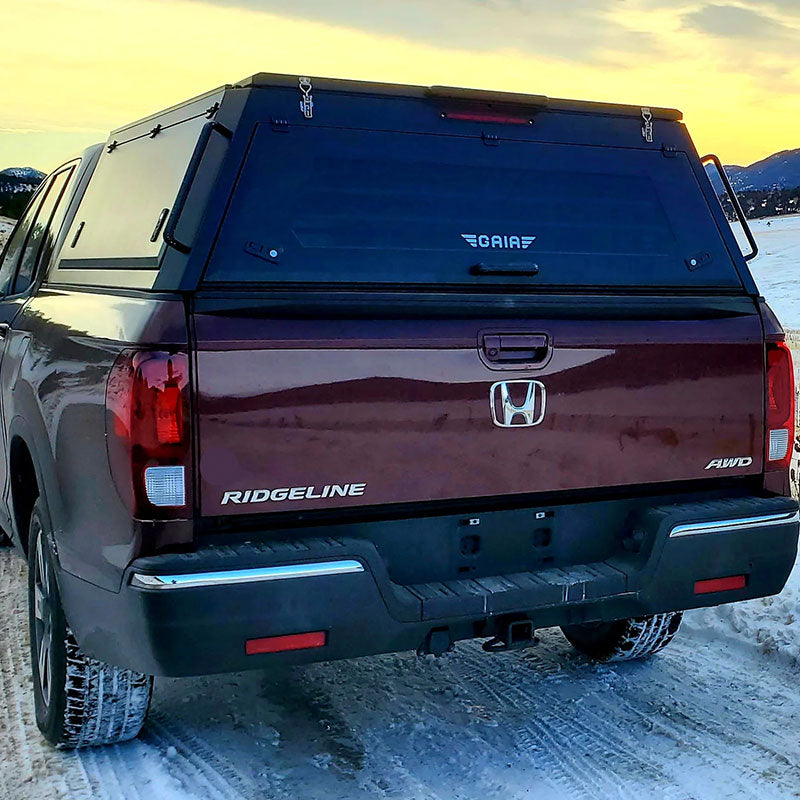 GAIA Campers Honda Ridgeline Truck Cap - 2017+ back view with sunset