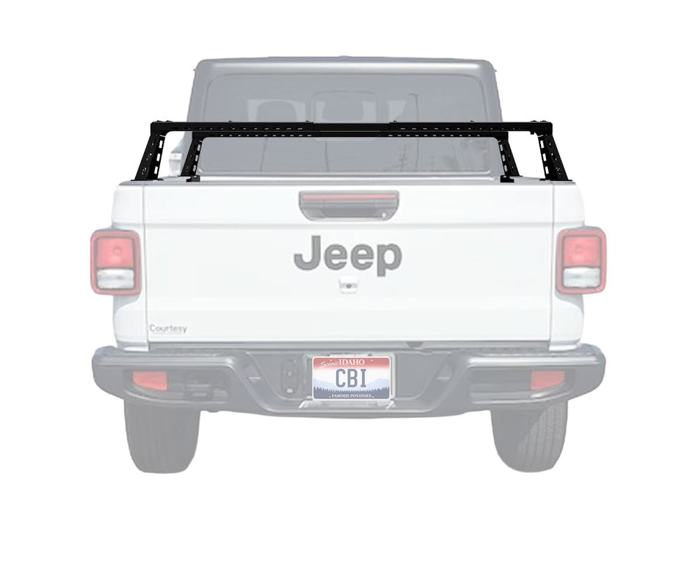White Jeep truck with a black roof rack on a white background