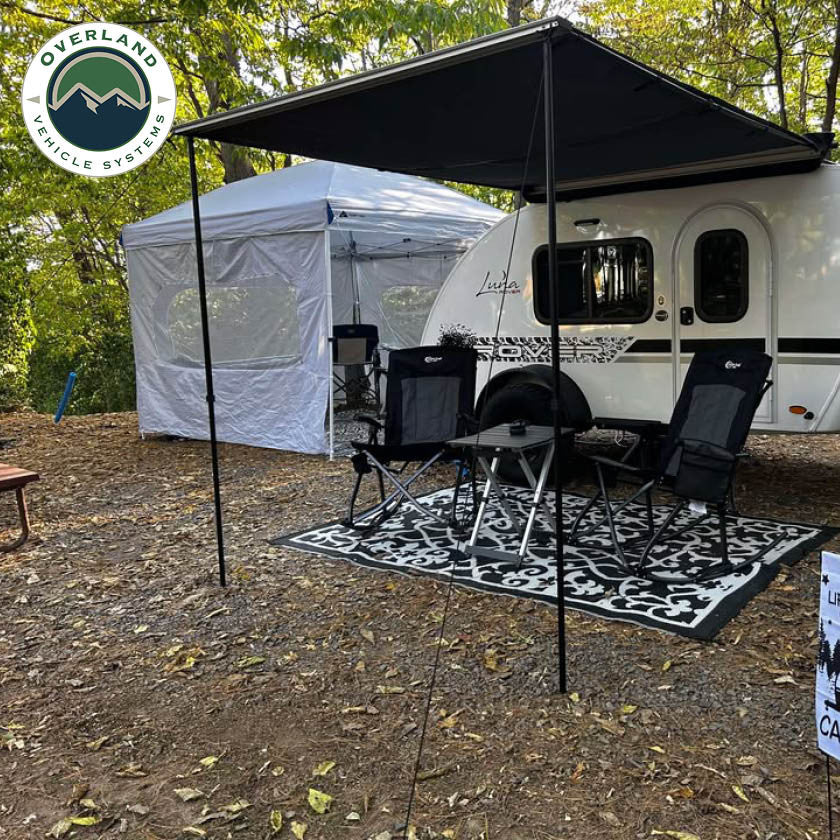 HD Nomadic 90 degree camping awning lifestyle shot at campsite