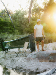 Folded Out Kakadu BlockOut Stretcher Tent Near Person 