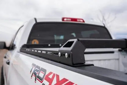 Back view of the rci low pro bed bars mounted on a truck