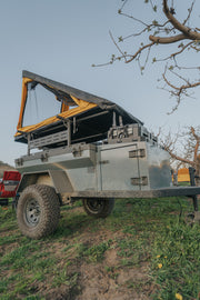 Patrol XC with grey clamshell tent in outdoors