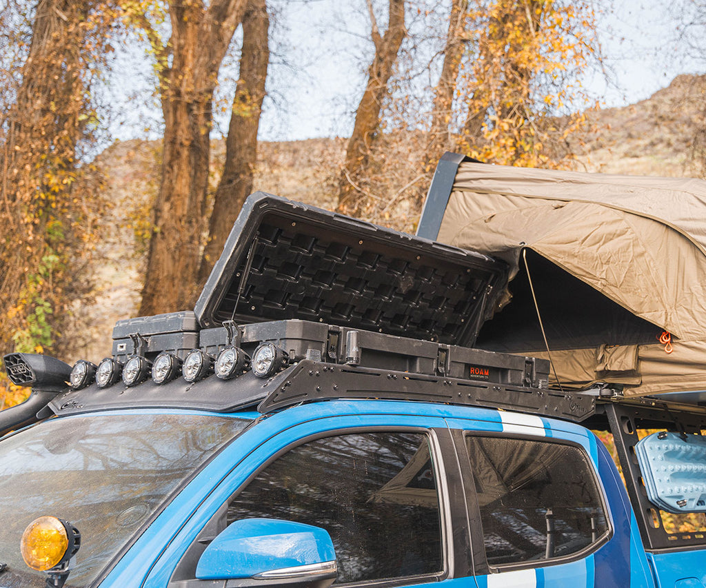 Image showing the prinsu pro roof rack mounted on a toyota tacoma hauling overlanding equipment