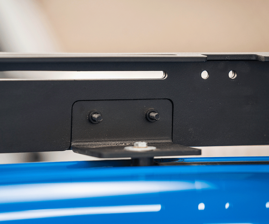 Image close up of the bolts on the side rail of the prinsu pro roof rack mounted on a toyota tacoma