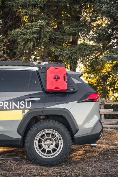 Rear Window Accessory Panel Mounted On Toyota Rav4 5th Gen With a case mounted on it