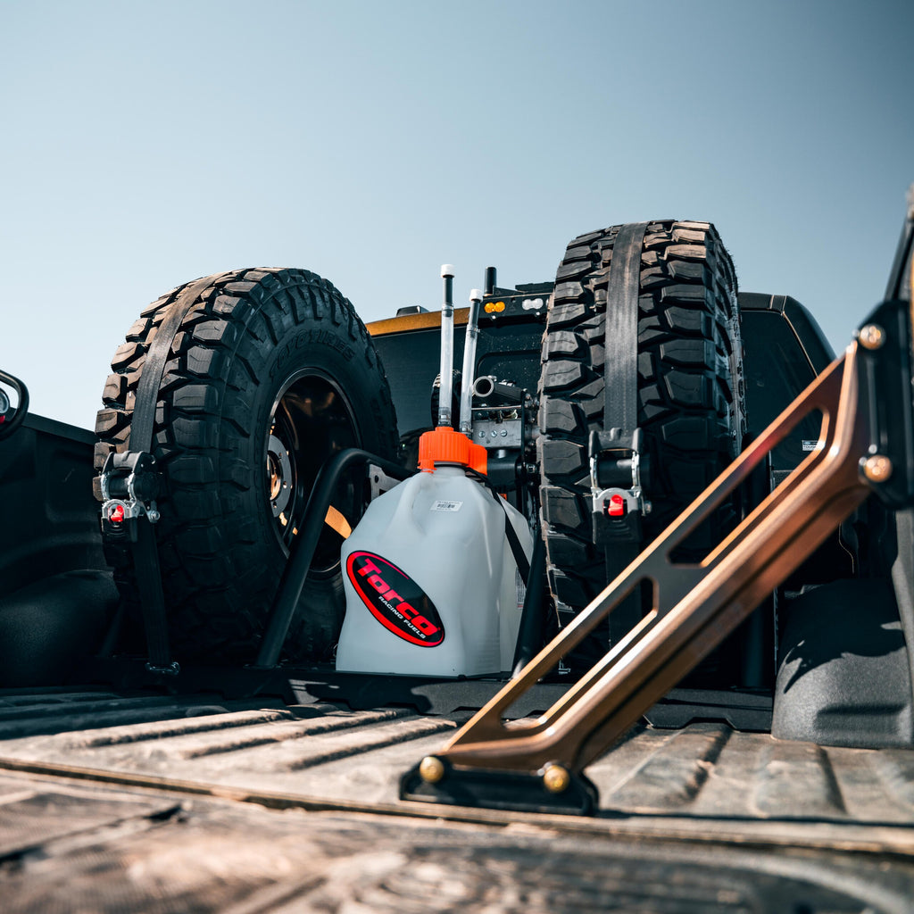 Ford Raptor chase rack MOLLE panel detail with mounted accessories