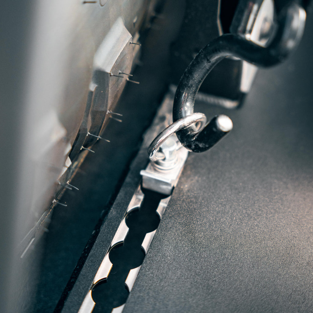 Raptor bed rack stainless steel track system close-up