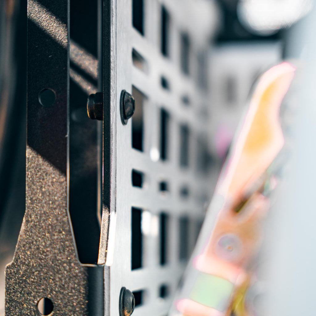 Ford Raptor bed rack with fuel cans and recovery equipment