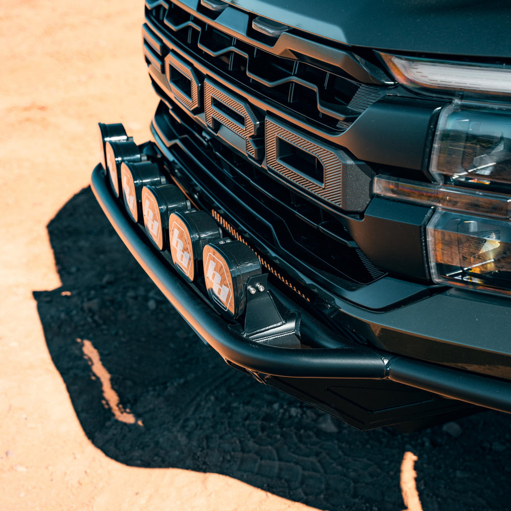 Raptor pre-runner bumper skid plate removal access point
