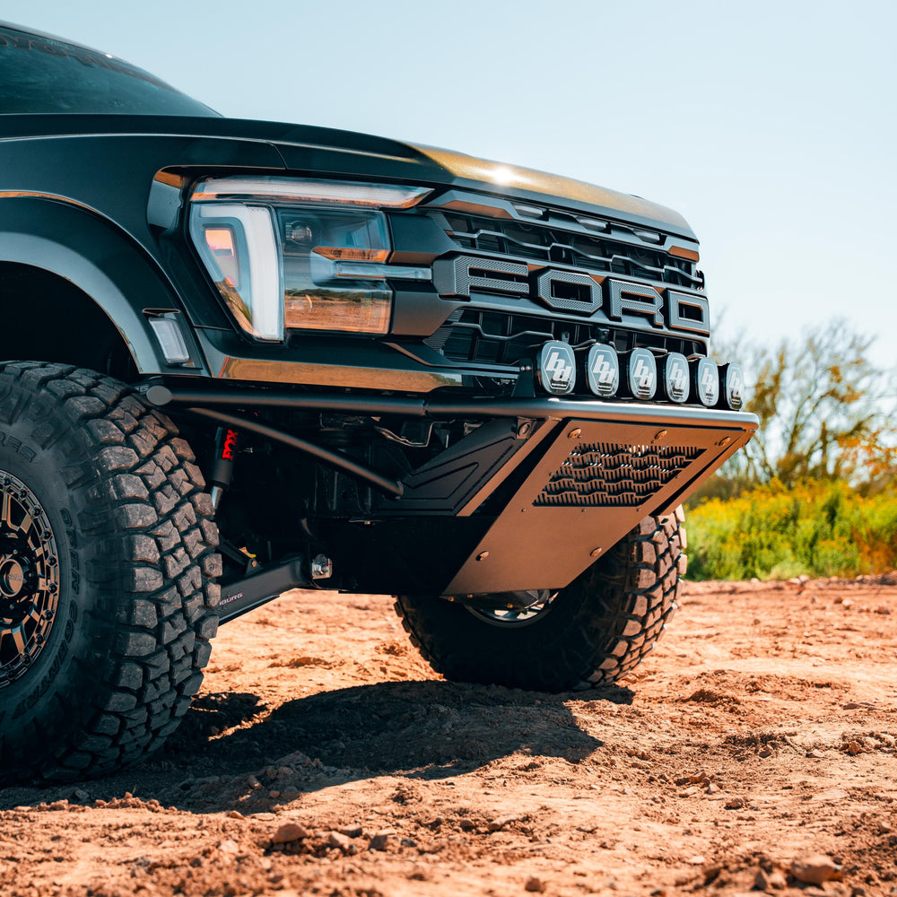 Raptor high clearance bumper with pod light brackets mounted