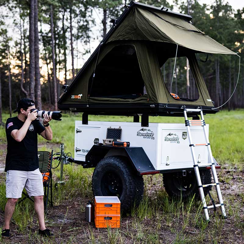 Runaway Campers Venturist XS Trailer with person beside for size perspective