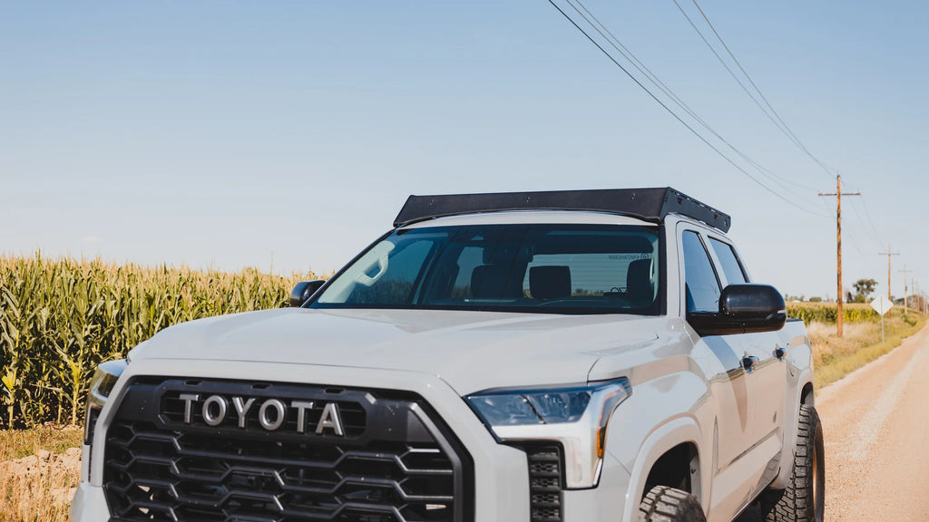 Close up Image of the grizzly roof rack mounted on a toyota tundra parked on the road